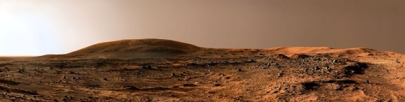 Calm day on Mars overlooking Husband Hill, which was named after Commander Rick Husband. He was the pilot of Colombia Space Shuttle which disintegrated on re-entry in 2003.