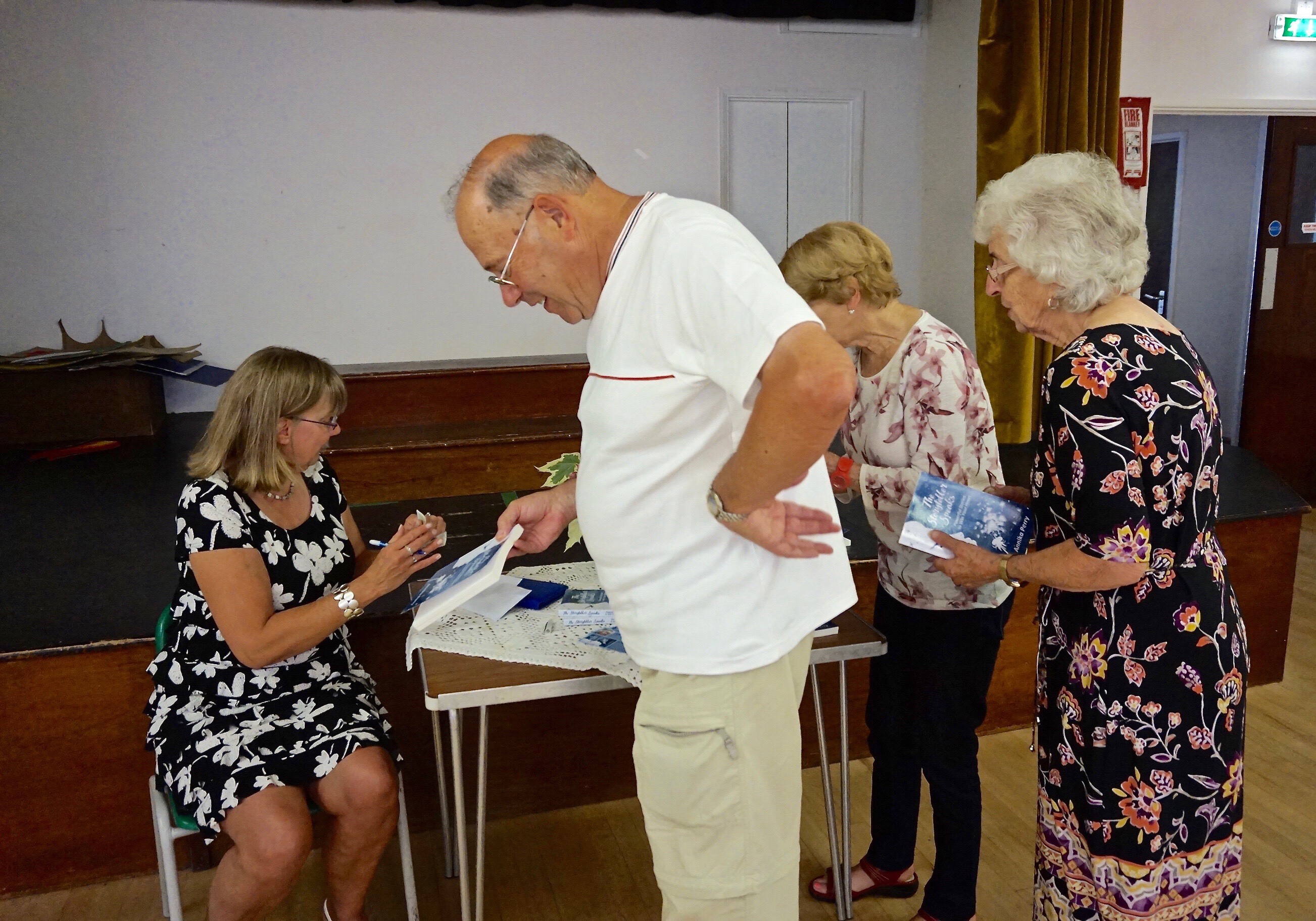 At the book signing of The Storyteller Speaks