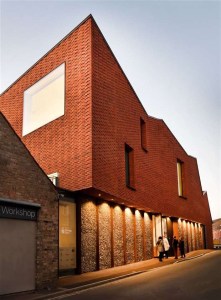 "Modern anglar, red brick building of new gallry space."